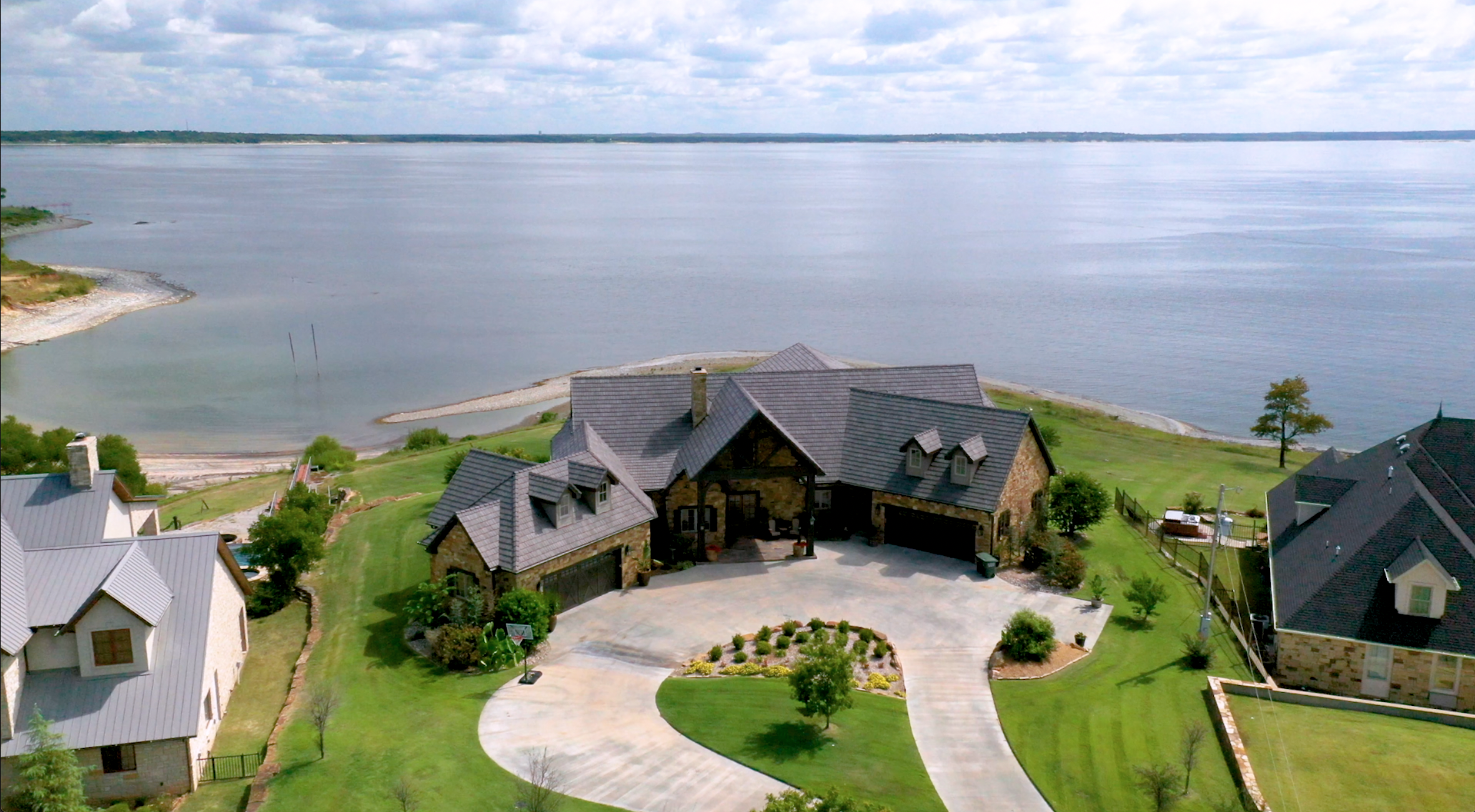 Stunning lakefront property in Kingston, Oklahoma on Lake Texoma. Featuring beautiful waterfront views, private docks, and luxurious lake homes for sale Texoma.